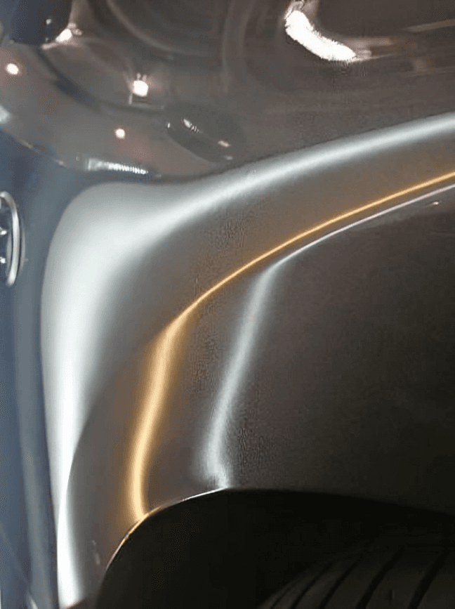 Same door panel following paintless dent repair in Ottawa area